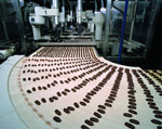 Biscuits on a corner conveyor